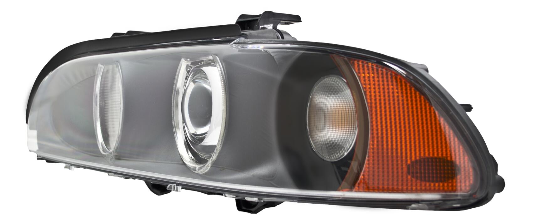 BMW Headlight Assembly – Driver Side (Xenon) (w/ Clear Turnsignal) 63126912439 – Hella 008052111