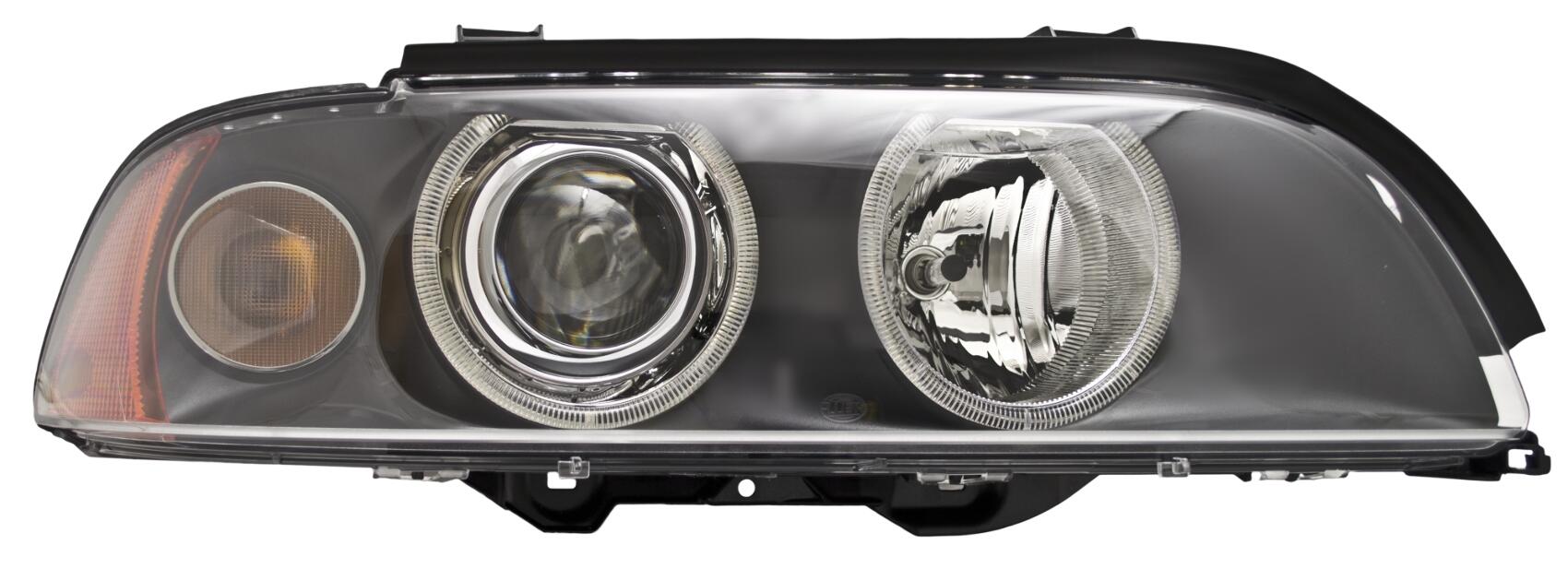 BMW Headlight Assembly – Passenger Side (Xenon) (w/ Clear Turnsignal) 63126912440 – Hella 008052121