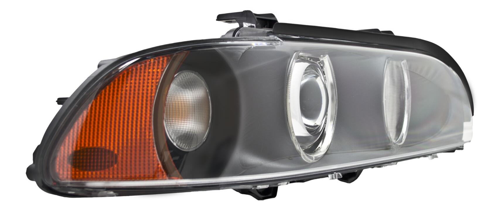 BMW Headlight Assembly – Passenger Side (Xenon) (w/ Clear Turnsignal) 63126912440 – Hella 008052121