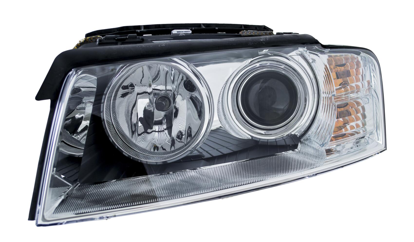 Audi Headlight Assembly – Driver Side (Xenon) (Adaptive) 4E0941029P – Hella 008540551