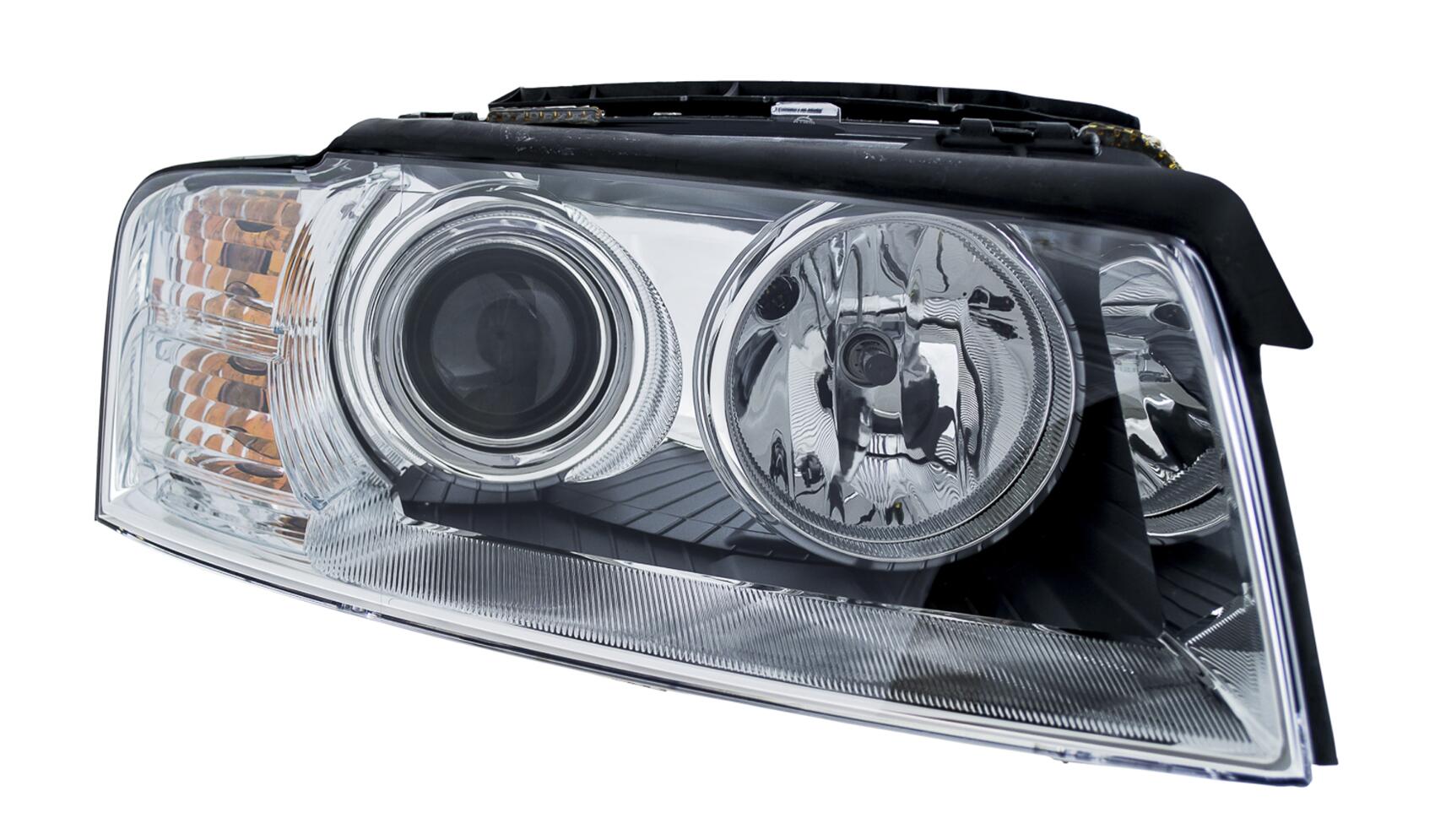 Audi Headlight Assembly – Passenger Side (Xenon) (Adaptive) 4E0941030P – Hella 008540561