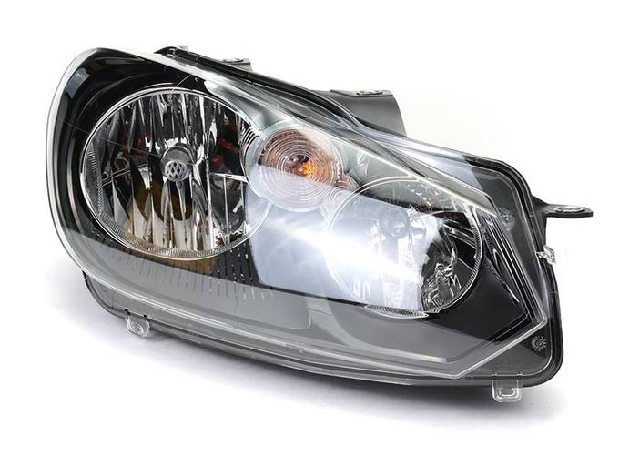 VW Headlight Assembly – Passenger Side (Halogen) 5K0941006C – Hella 009901261