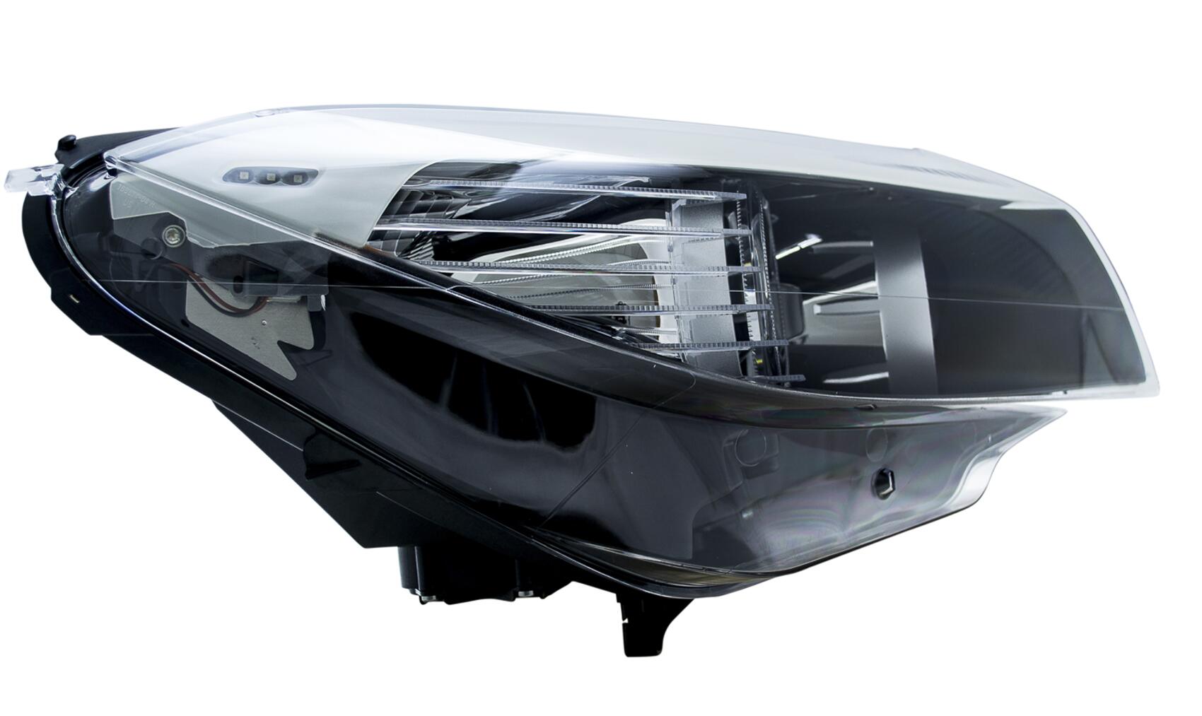 BMW Headlight Assembly – Passenger Side (Xenon) (Adaptive) 63127228868 – Hella 009934461