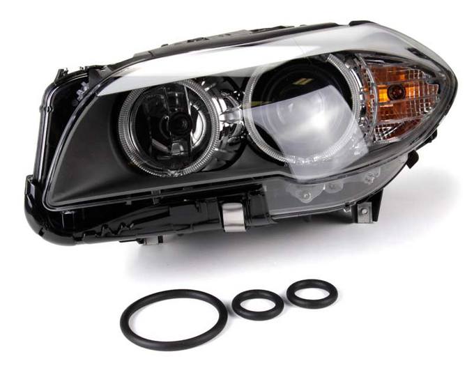 BMW Headlight Assembly – Driver Side (Halogen) 63117203243 – Hella 010131051