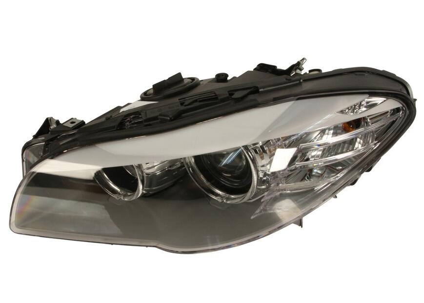 BMW Headlight Assembly – Driver Side (Halogen) 63117203243 – Hella 010131051