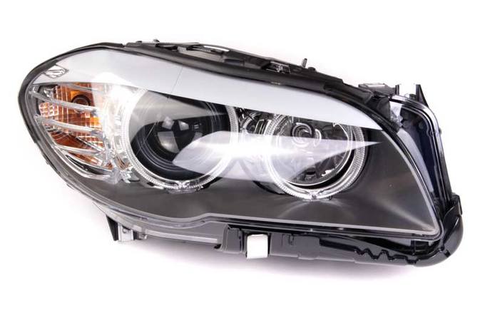 BMW Headlight Assembly – Passenger Side (Halogen) 63117203244 – Hella 010131061