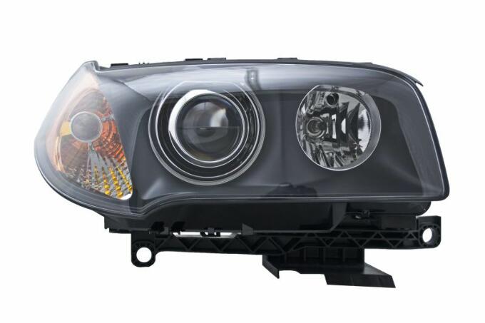 BMW Headlight Assembly – Passenger Side (Xenon) 63123418398 – Hella 010166021