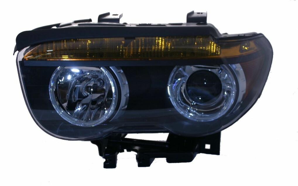 BMW Headlight Assembly – Driver Side (Xenon) 63127165449 – Hella 158079006