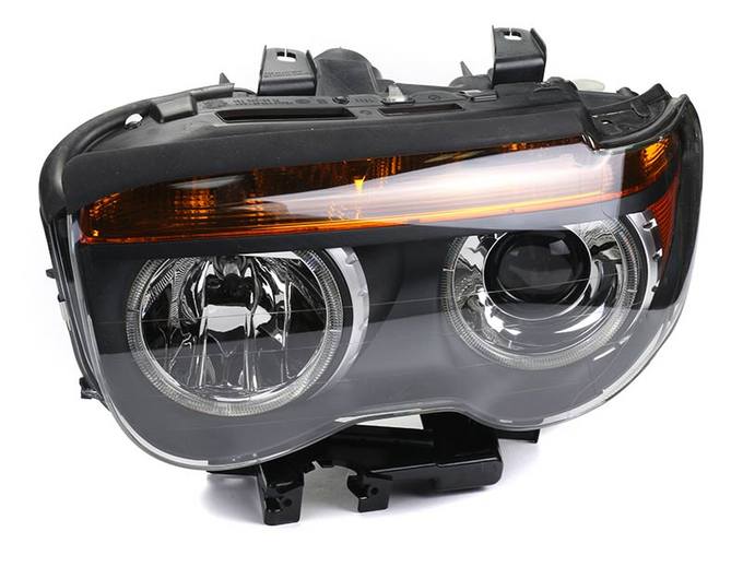 BMW Headlight Assembly – Driver Side (Xenon) 63127165449 – Hella 158079006