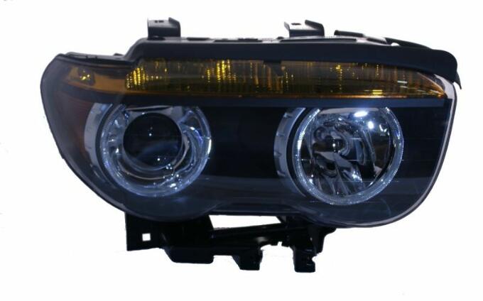 BMW Headlight Assembly – Passenger Side (Xenon) 63127165450 – Hella 158080006