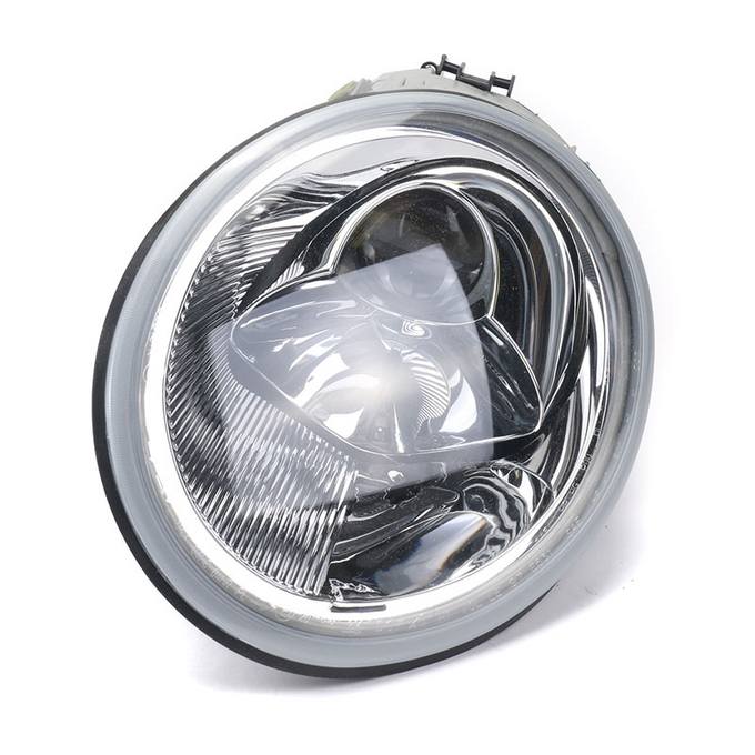 VW Headlight Assembly – Driver Side (Halogen) (NSF) 1C0941029K – TYC 205446001