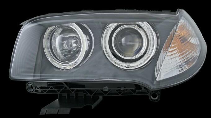 BMW Headlight Assembly – Driver Side (Xenon) (Adaptive) 63123456045 – Hella 354415111