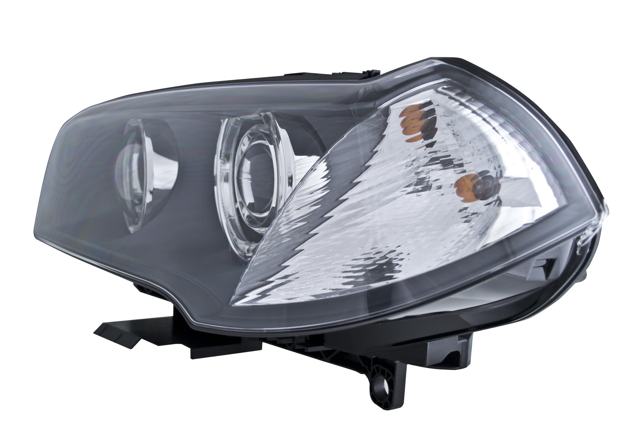 BMW Headlight Assembly – Driver Side (Xenon) (Adaptive) 63123456045 – Hella 354415111