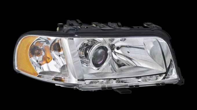 Audi Headlight Assembly – Passenger Side (Halogen) 4D0941004AB – Hella 354450021