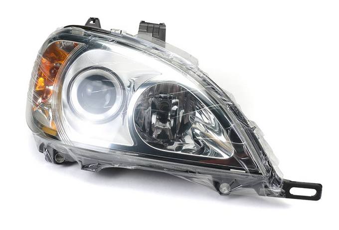 Mercedes Headlight Assembly – Passenger Side (Halogen) 163820506164 – Hella 223151061