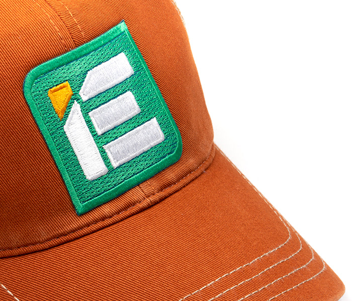 IE Twill Snapback Trucker Hat | Orange & Kahaki